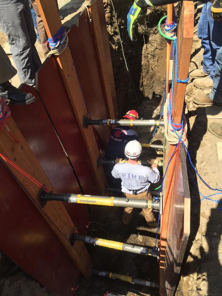 Members of the Regional Trench Rescue Team train in &quot;live dirt&quot; at River Bend Cemetery in Westerly. 